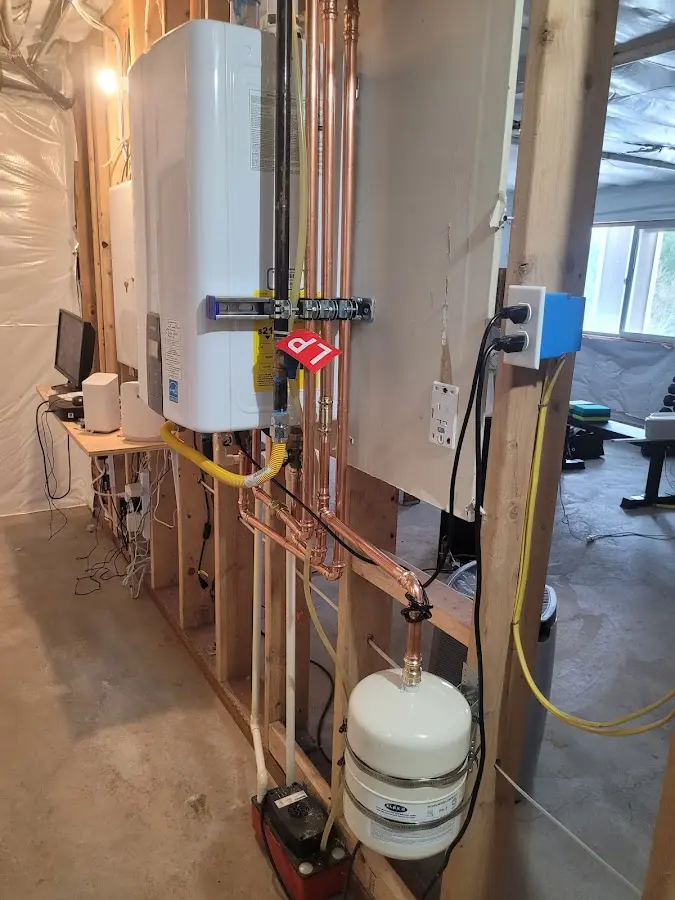 Licensed plumber repairing a kitchen sink in Gypsum